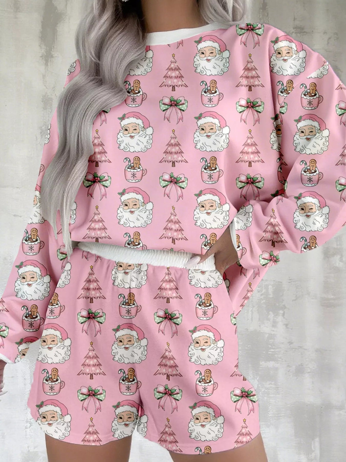Wicked Thread Society pink Christmas lounge set with Santa, gingerbread man, and tree print on a round neck top