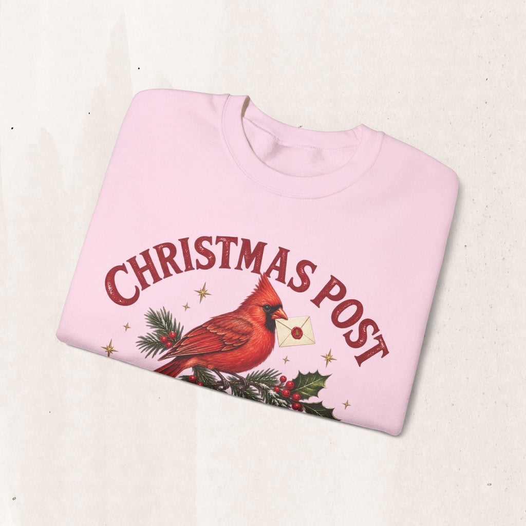 Wicked Thread Society light pink crewneck sweatshirt featuring a cardinal bird with a letter and Christmas Post text.
