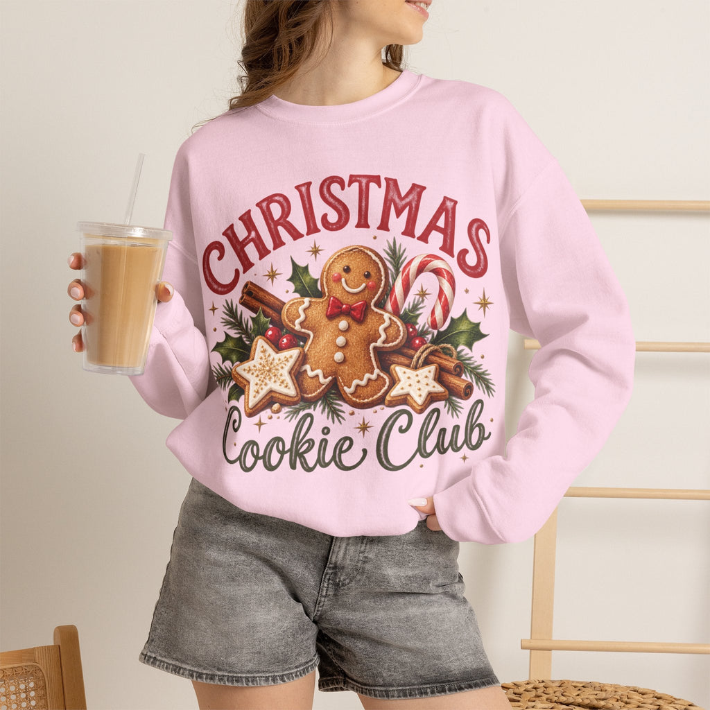 Wicked Thread Society light pink crewneck sweatshirt featuring a gingerbread man graphic and Christmas motifs.
