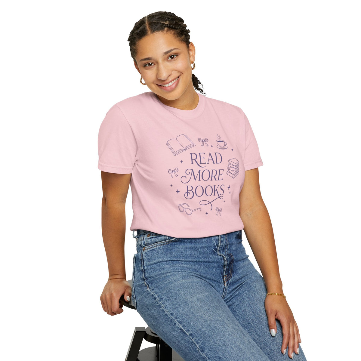 Wicked Thread Society light pink cotton graphic tee with Read More Books illustration worn by a smiling woman