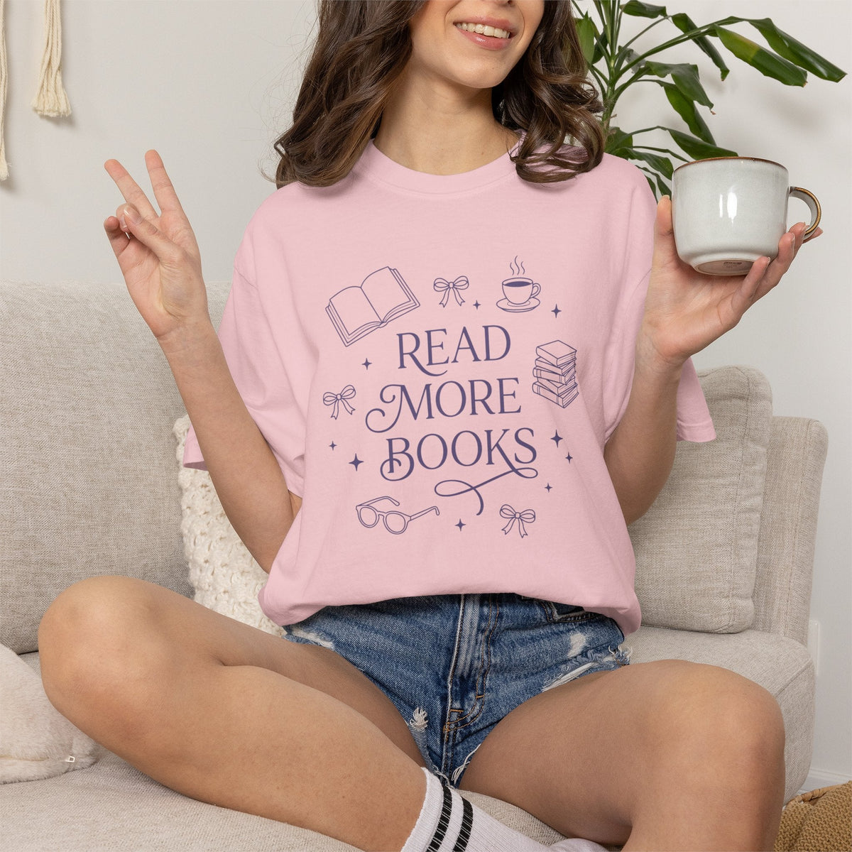 Wicked Thread Society light pink relaxed cotton graphic tee with Read More Books illustration worn by a woman