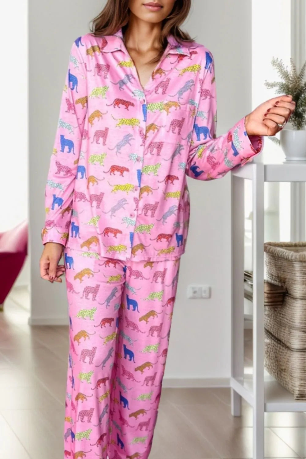 Wicked Thread Society pink lounge set featuring a colorful leopard print pattern on a button-down top and pants.