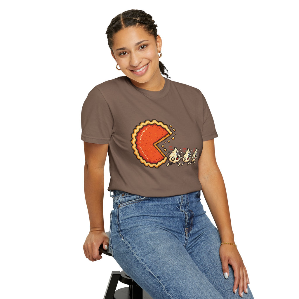 Wicked Thread Society brown pixel art t-shirt featuring a pumpkin pie Pac-Man design worn by a smiling woman.