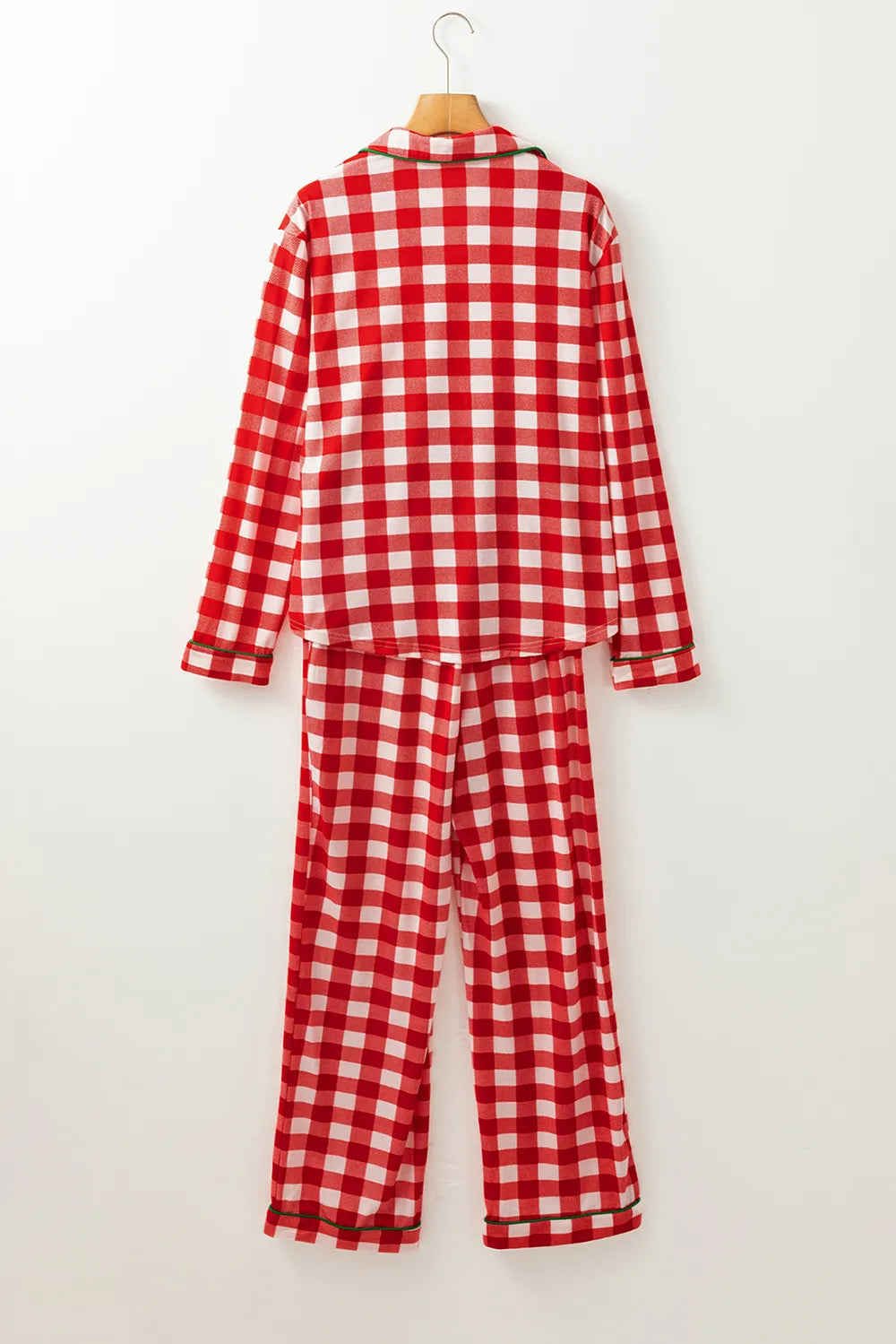 Wicked Thread Society red and white plaid long sleeve collared pajama set with matching pants on a hanger