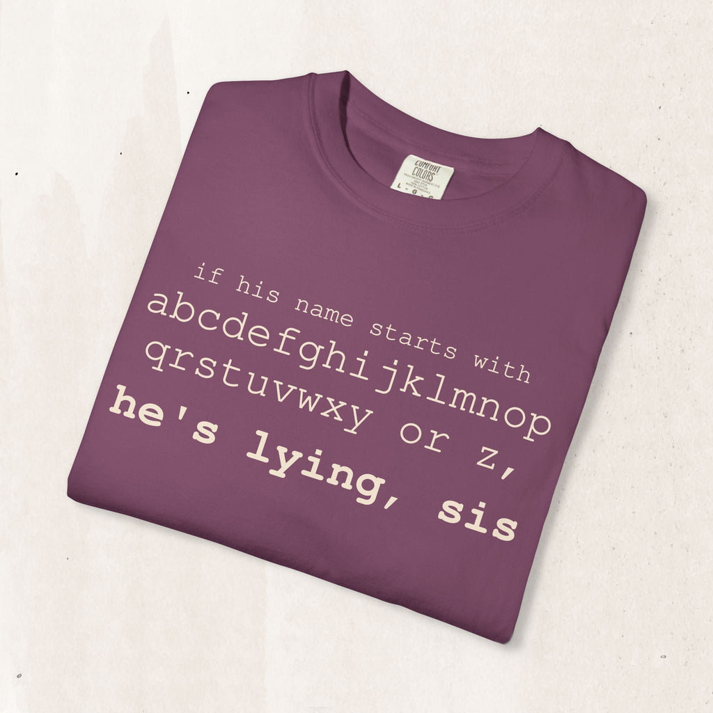 He's Lying, Sis T-shirt | Typographic alphabet humor tee Printify