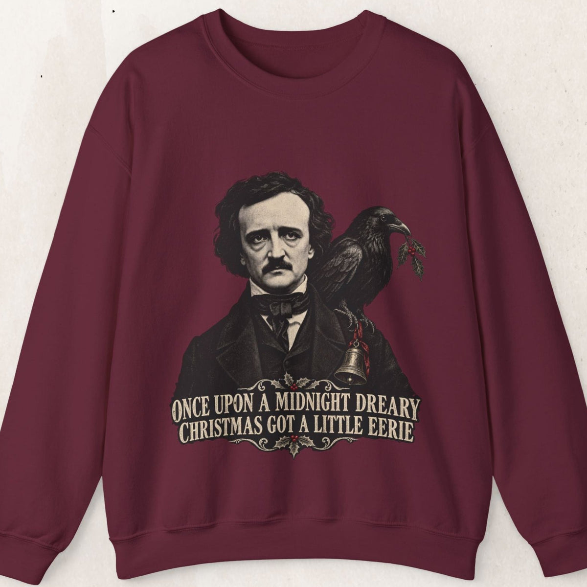 Wicked Thread Society burgundy crewneck sweatshirt featuring an Edgar Allan Poe and raven Christmas illustration.