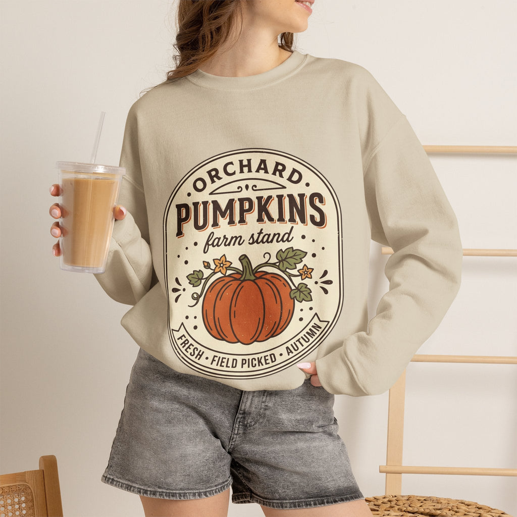 Wicked Thread Society beige crewneck sweatshirt with vintage pumpkin farmstand graphic, worn with grey denim shorts.