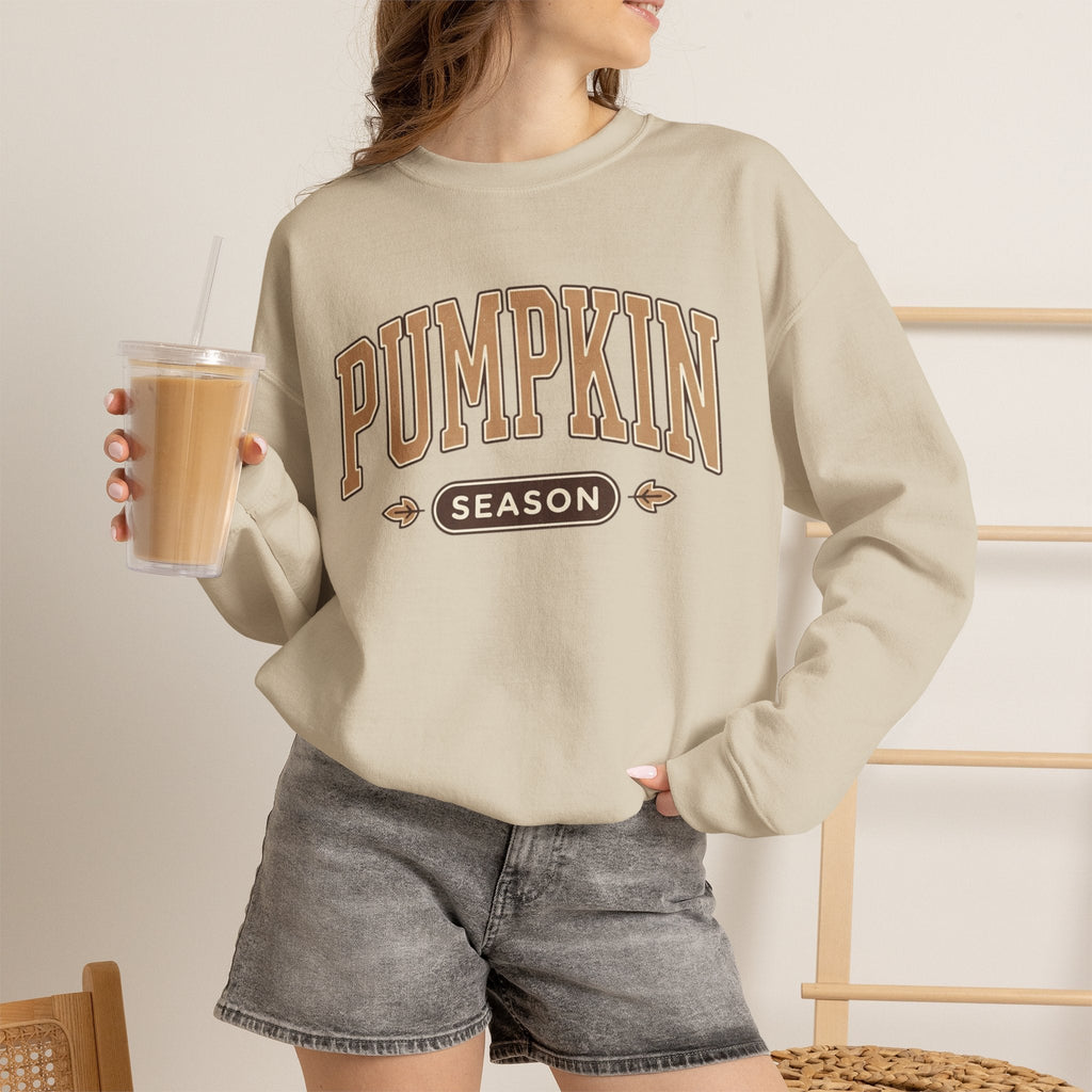 Wicked Thread Society beige crewneck sweatshirt with vintage Pumpkin Season graphic worn with grey denim shorts.