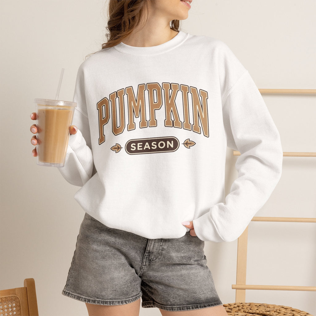 Wicked Thread Society white crewneck sweatshirt with Pumpkin Season graphic, worn with grey denim shorts and iced coffee