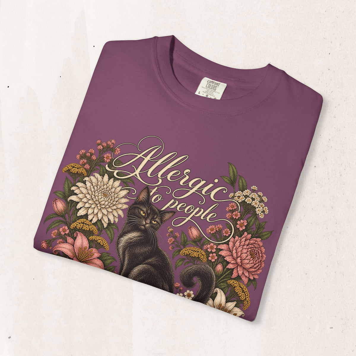 Wicked Thread Society purple graphic t-shirt featuring a black cat illustration and floral wreath with script text.