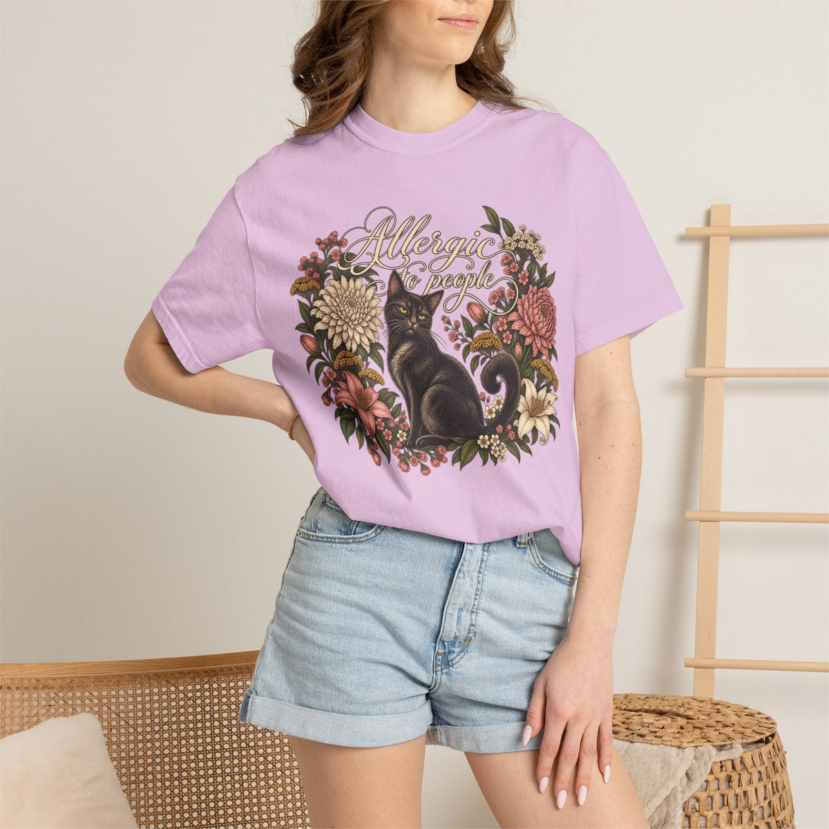 Wicked Thread Society light purple t-shirt featuring a black cat illustration inside a vintage floral wreath
