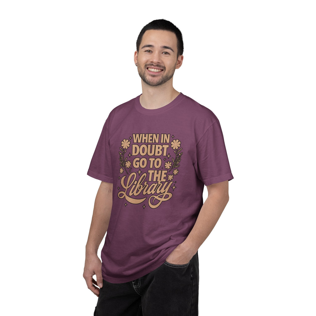 Wicked Thread Society purple graphic tee with When in Doubt Go to the Library text and floral design on a man