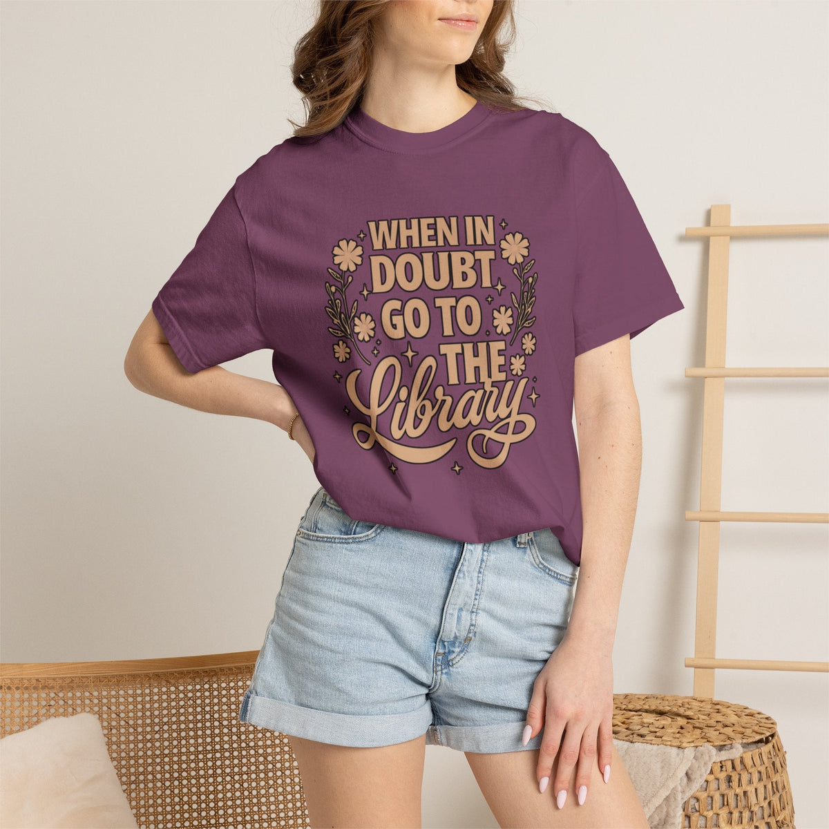 Wicked Thread Society purple cotton graphic tee with When in Doubt Go to the Library text and floral design