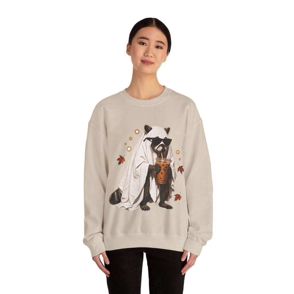 Wicked Thread Society beige crewneck sweatshirt featuring a raccoon in a ghost costume drinking boba tea