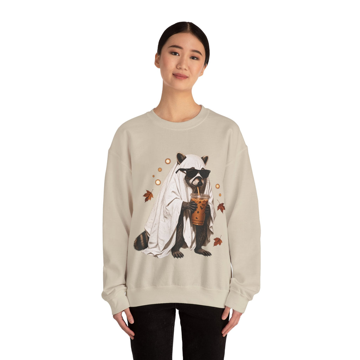 Wicked Thread Society beige crewneck sweatshirt featuring a raccoon in a ghost costume drinking boba tea