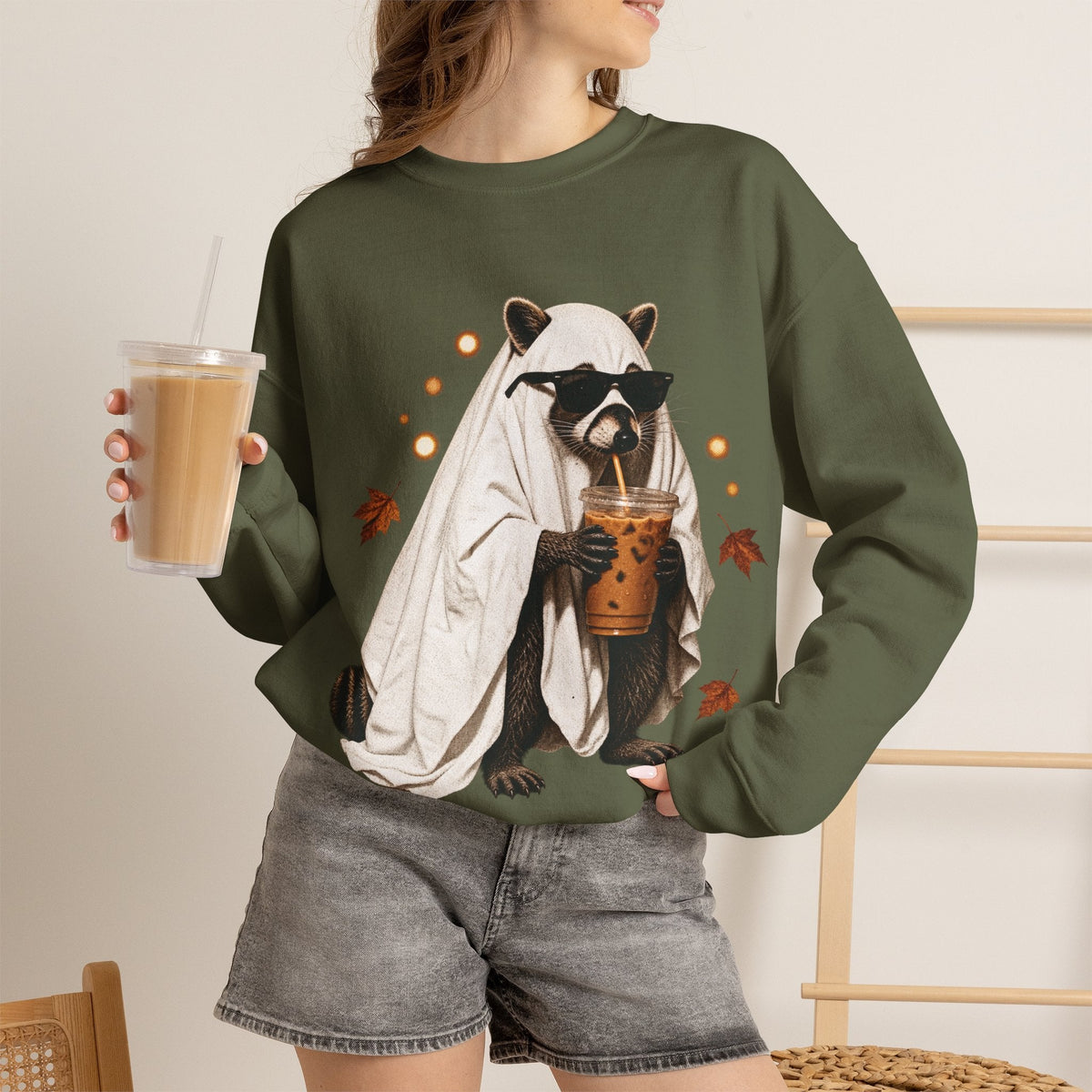 Wicked Thread Society olive green crewneck sweatshirt featuring a raccoon in a ghost costume drinking boba tea