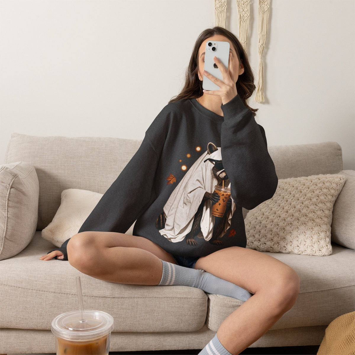 Wicked Thread Society charcoal crewneck sweatshirt featuring a cute raccoon in a ghost costume holding boba tea.