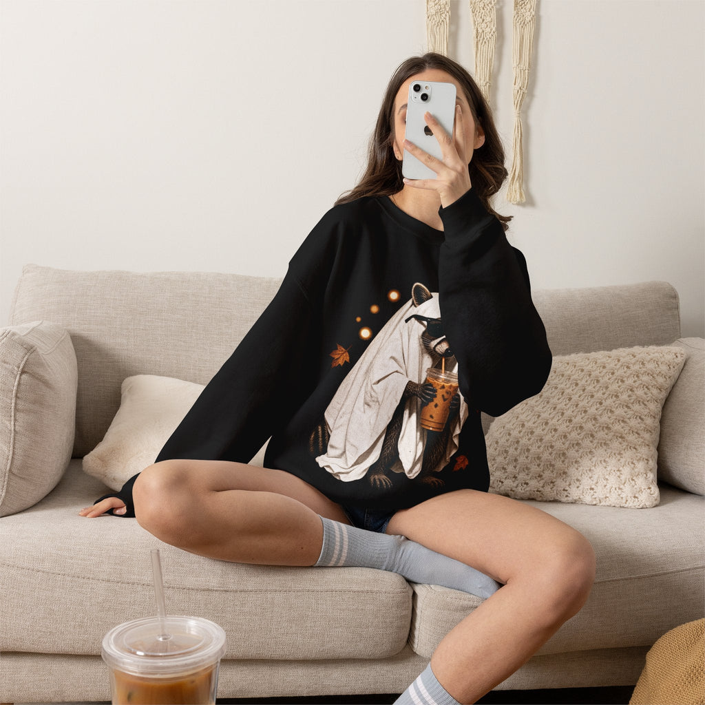 Wicked Thread Society black crewneck sweatshirt featuring a cute raccoon in a ghost costume holding a boba tea
