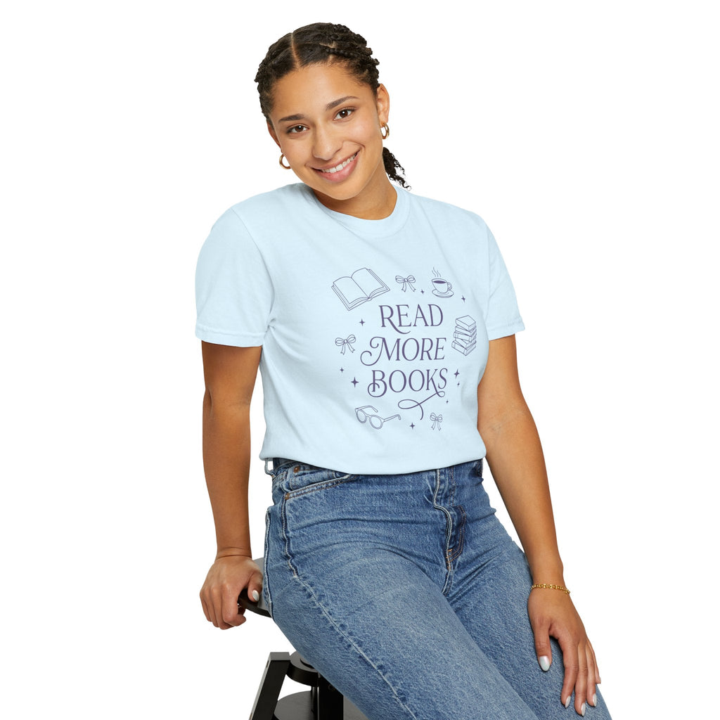 Wicked Thread Society light blue cotton graphic tee with Read More Books illustration worn by a smiling woman