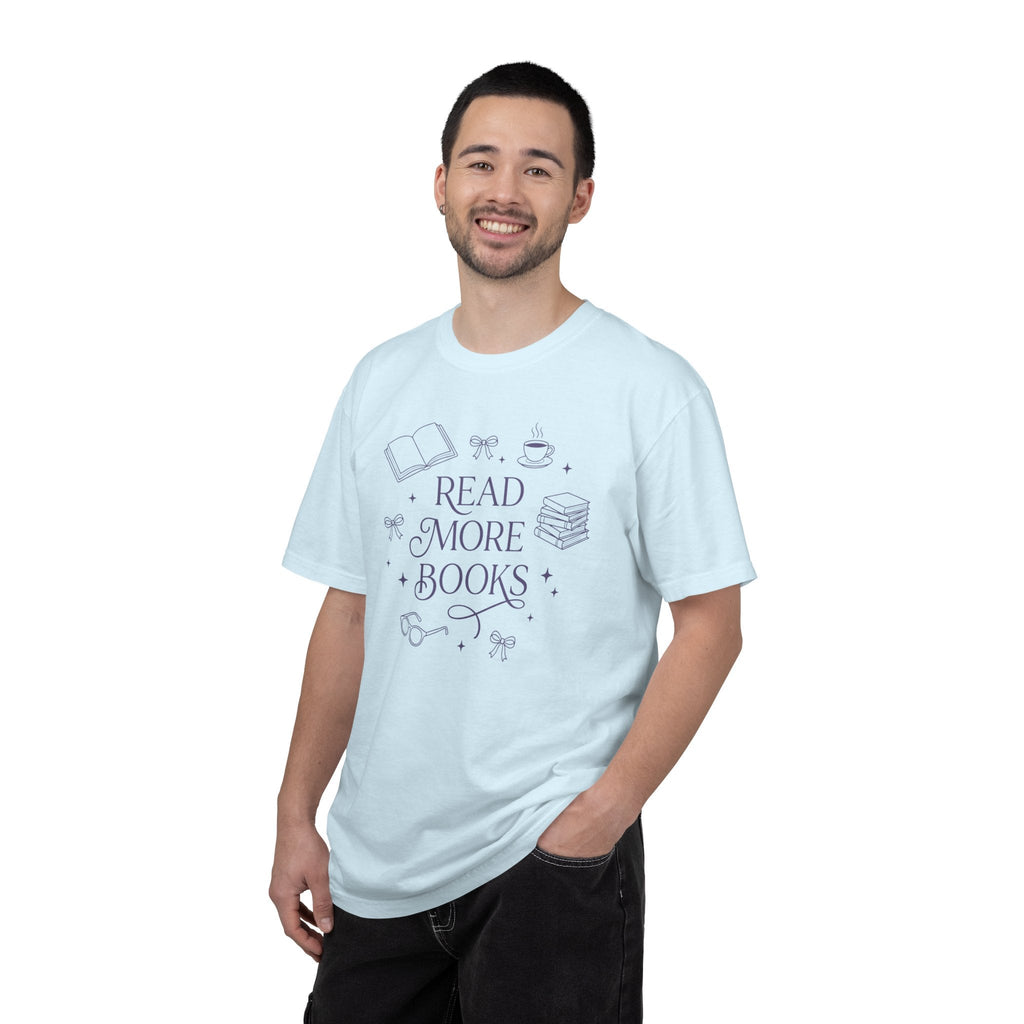 A man wearing a light blue Wicked Thread Society graphic tee with a Read More Books illustration in dark ink.