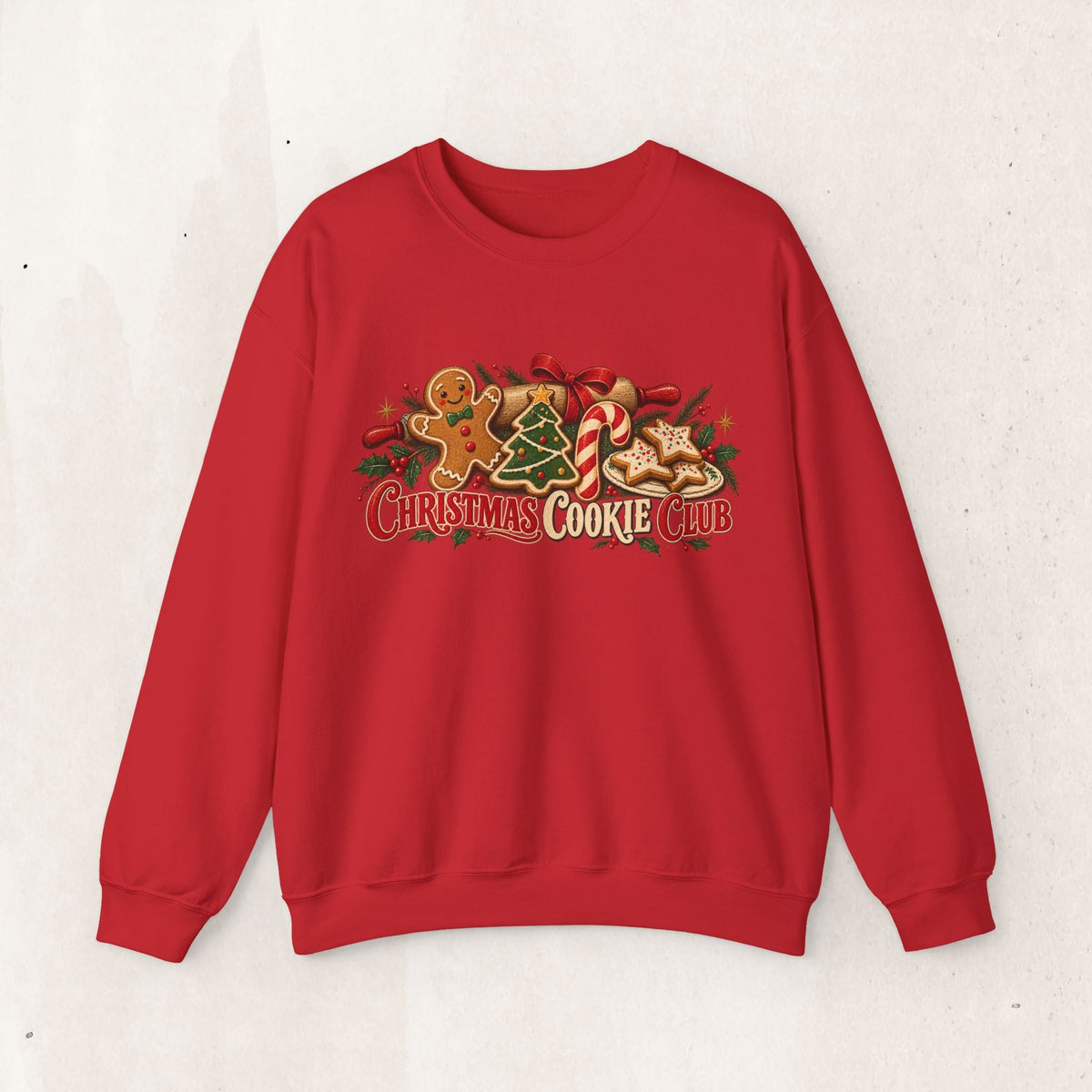 Wicked Thread Society red crewneck sweatshirt featuring a festive Christmas Cookie Club graphic with holiday treats.