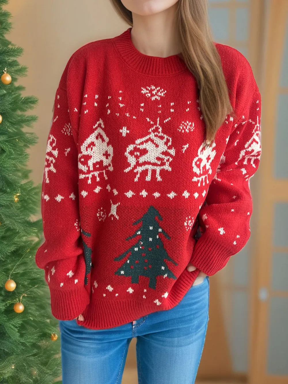 Wicked Thread Society red knit Christmas sweater with festive tree and snowflake patterns, worn with blue jeans.