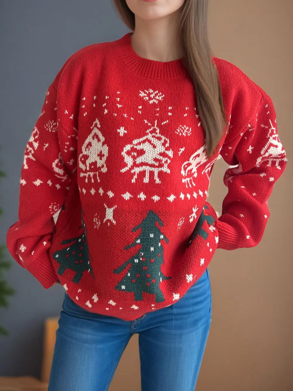 Wicked Thread Society red Christmas sweater with white reindeer and green tree patterns, round neck, long sleeves.