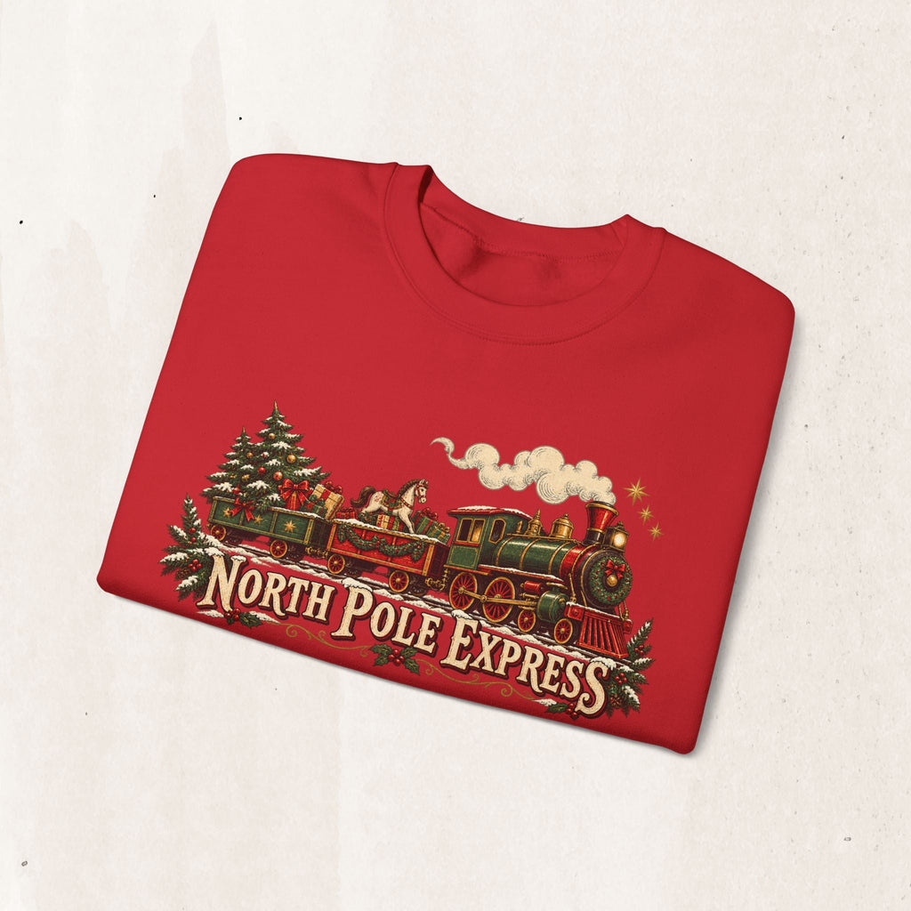 Wicked Thread Society red crewneck sweatshirt featuring a vintage North Pole Express steam train Christmas graphic.