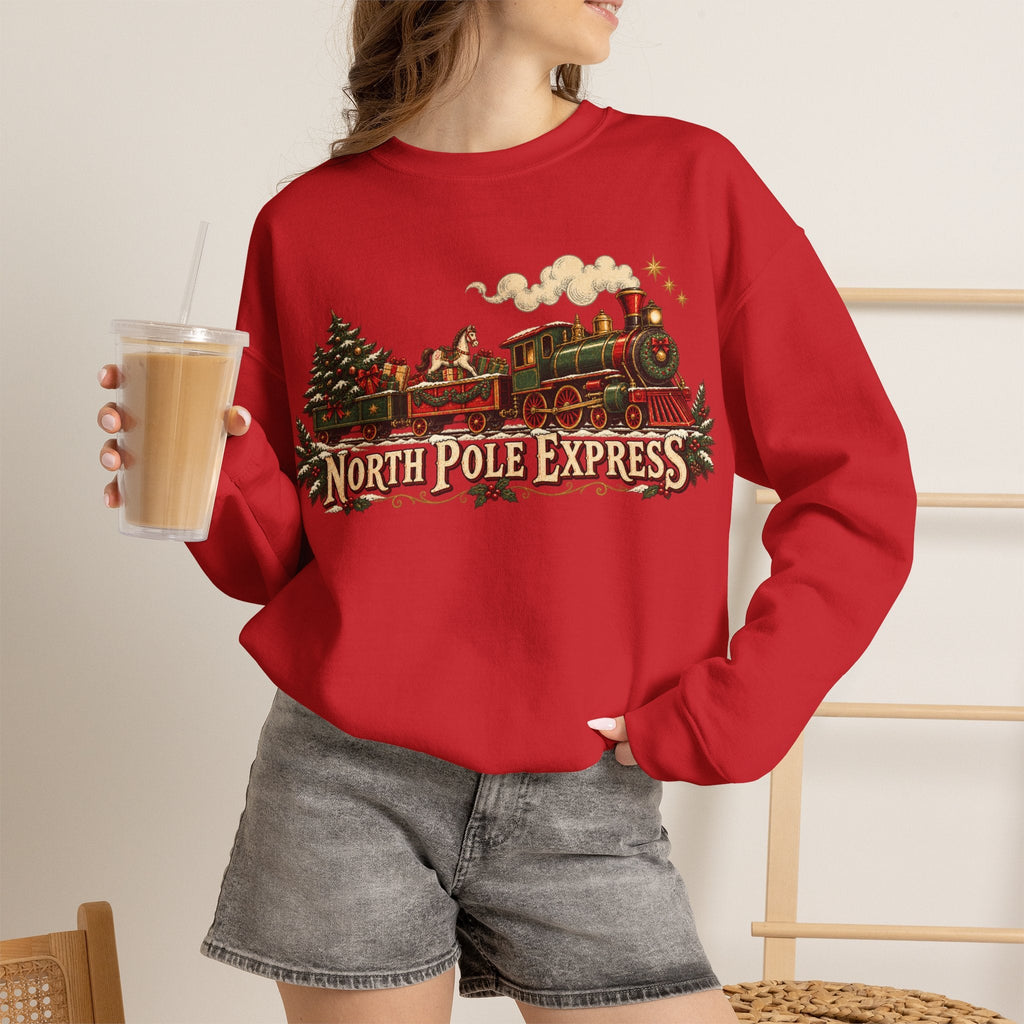 Wicked Thread Society red crewneck sweatshirt with vintage North Pole Express train graphic worn by a woman