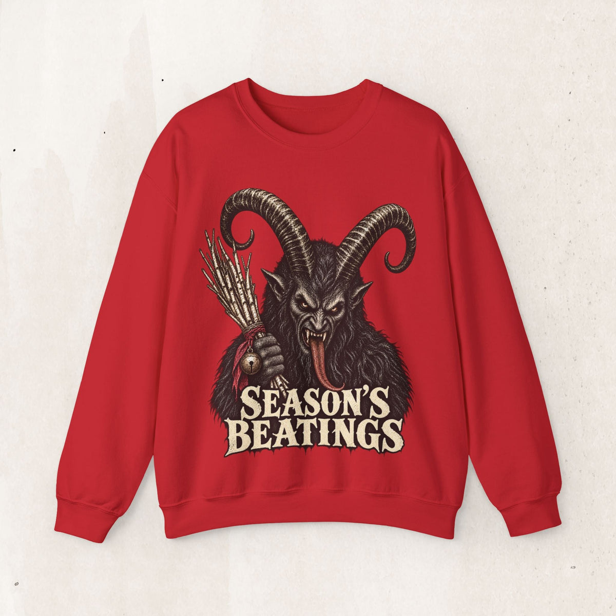 Wicked Thread Society red crewneck sweatshirt featuring a detailed Krampus illustration and Seasons Beatings text