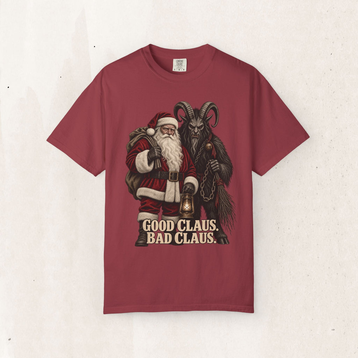 Wicked Thread Society heavyweight red cotton graphic tee featuring Santa and Krampus with Good Claus Bad Claus text.