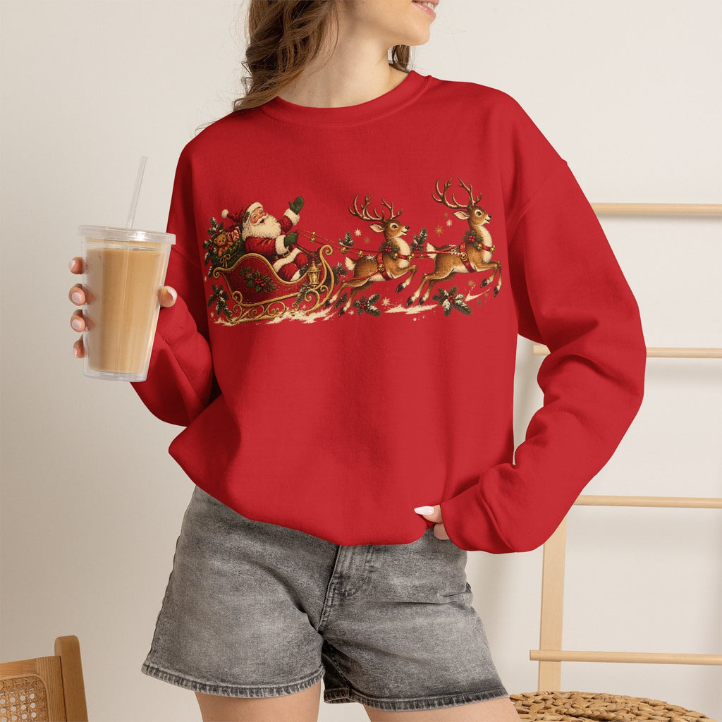 Wicked Thread Society red crewneck sweatshirt featuring a vintage Santa sleigh and reindeer print, worn by a woman.