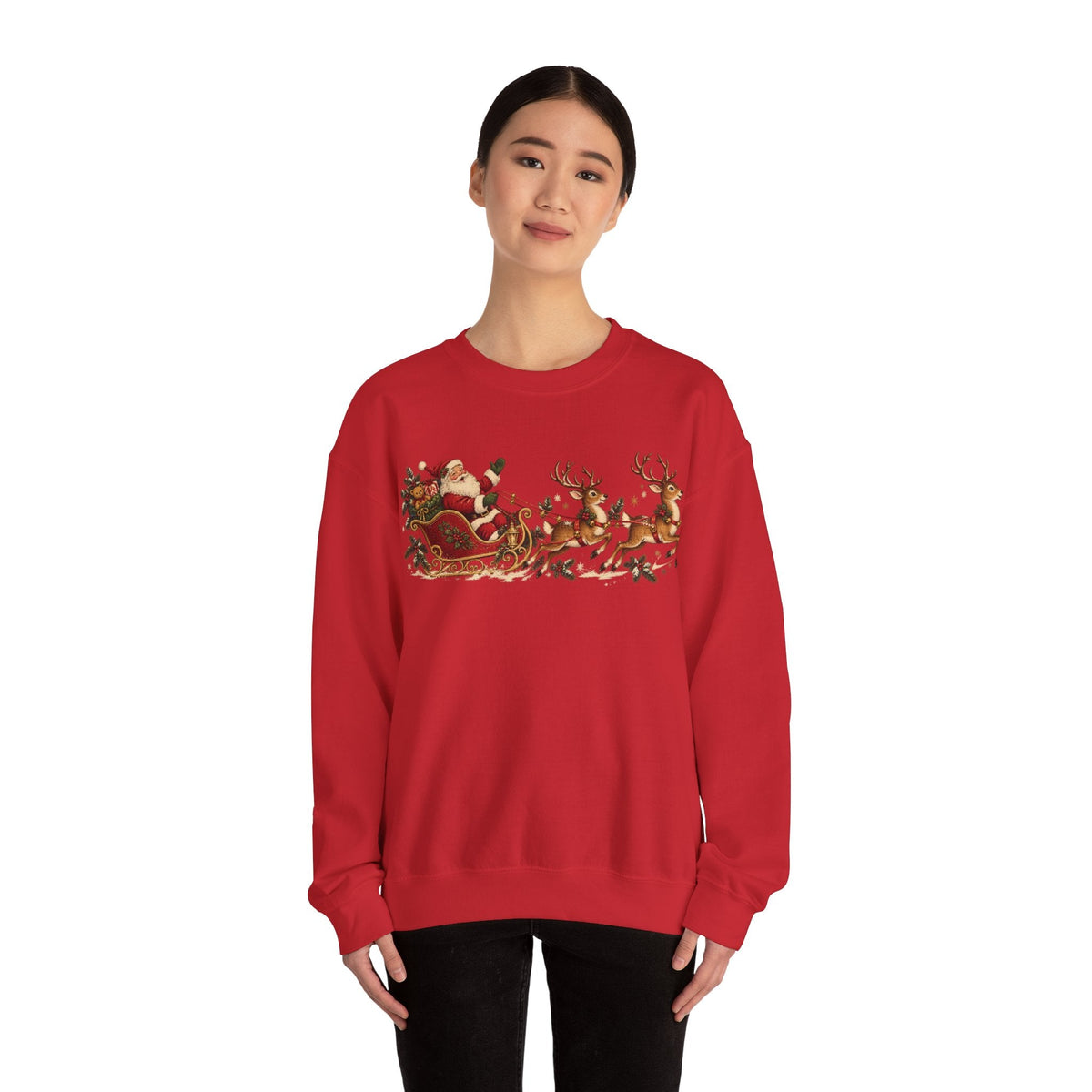 Wicked Thread Society red crewneck sweatshirt featuring a vintage Santa and reindeer sleigh print on a model