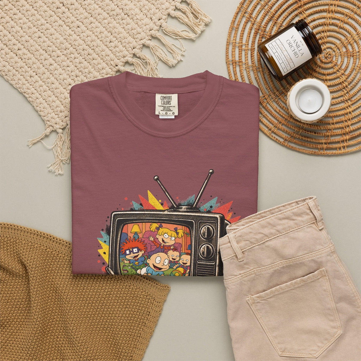 Wicked Thread Society maroon graphic tee featuring a vintage Rugrats TV design, folded on a neutral background.