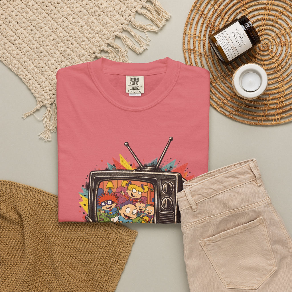 Wicked Thread Society pink graphic t-shirt featuring a retro TV with Rugrats characters on a neutral flat lay.