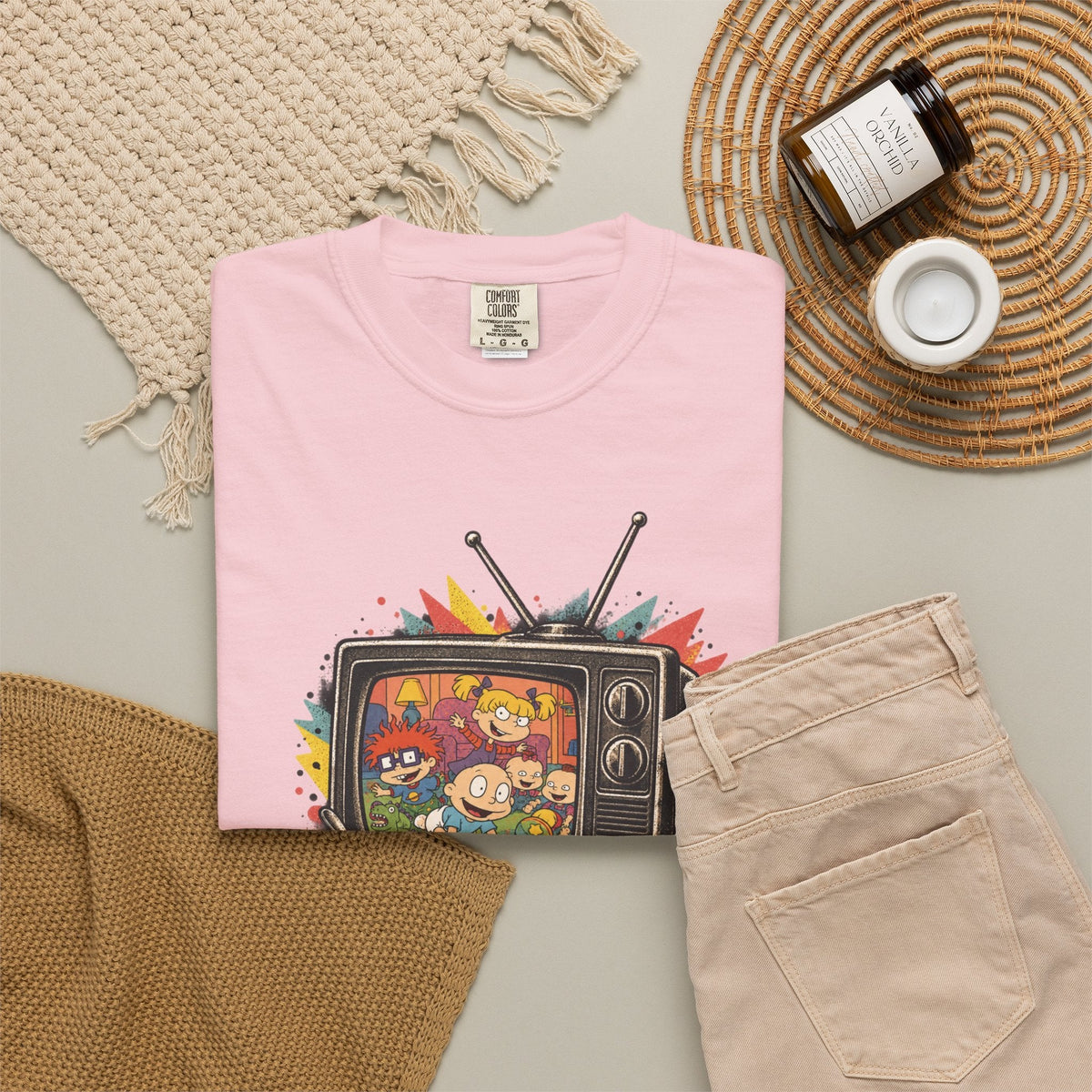 Wicked Thread Society pink Rugrats graphic tee featuring a retro television print with 90s cartoon characters