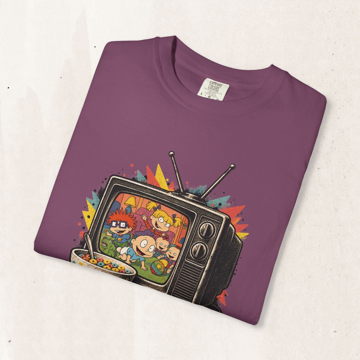 Wicked Thread Society purple cotton t-shirt featuring a retro Rugrats TV graphic print with 90s cartoon characters.