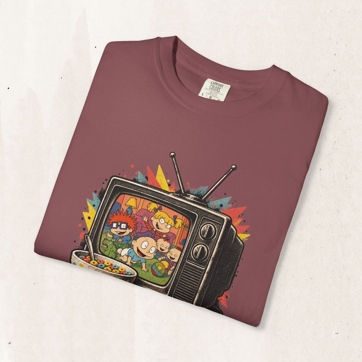 Wicked Thread Society maroon graphic t-shirt featuring a retro television set with Rugrats characters and cereal bowl