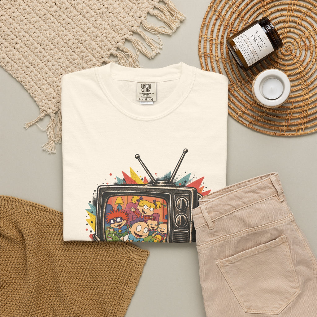 Wicked Thread Society cream graphic tee featuring a retro Rugrats TV design with colorful 90s cartoon characters.