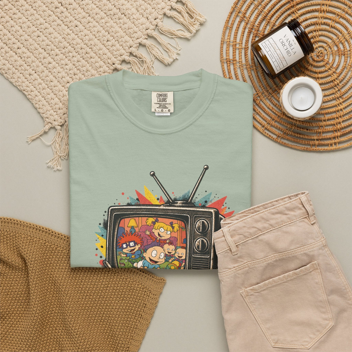 Wicked Thread Society sage green Rugrats graphic tee featuring a retro TV print with 90s cartoon characters