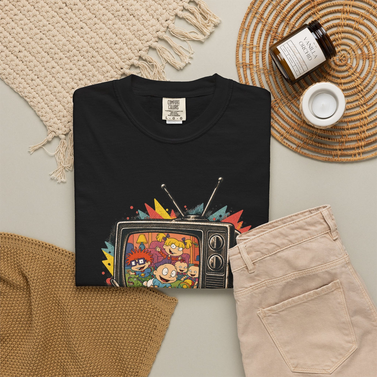 Wicked Thread Society black graphic tee featuring a retro Rugrats TV design, displayed on a flat lay background.