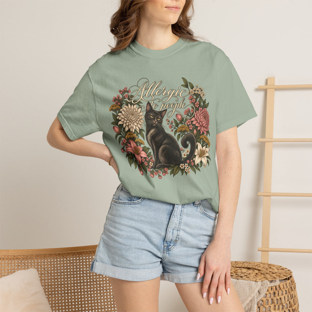 Wicked Thread Society sage green graphic tee featuring a black cat illustration and floral wreath with script text