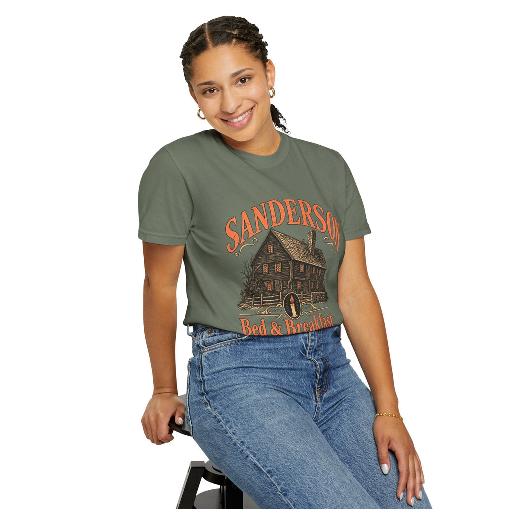Wicked Thread Society Sanderson Bed & Breakfast graphic tee in olive green cotton worn by a smiling woman.
