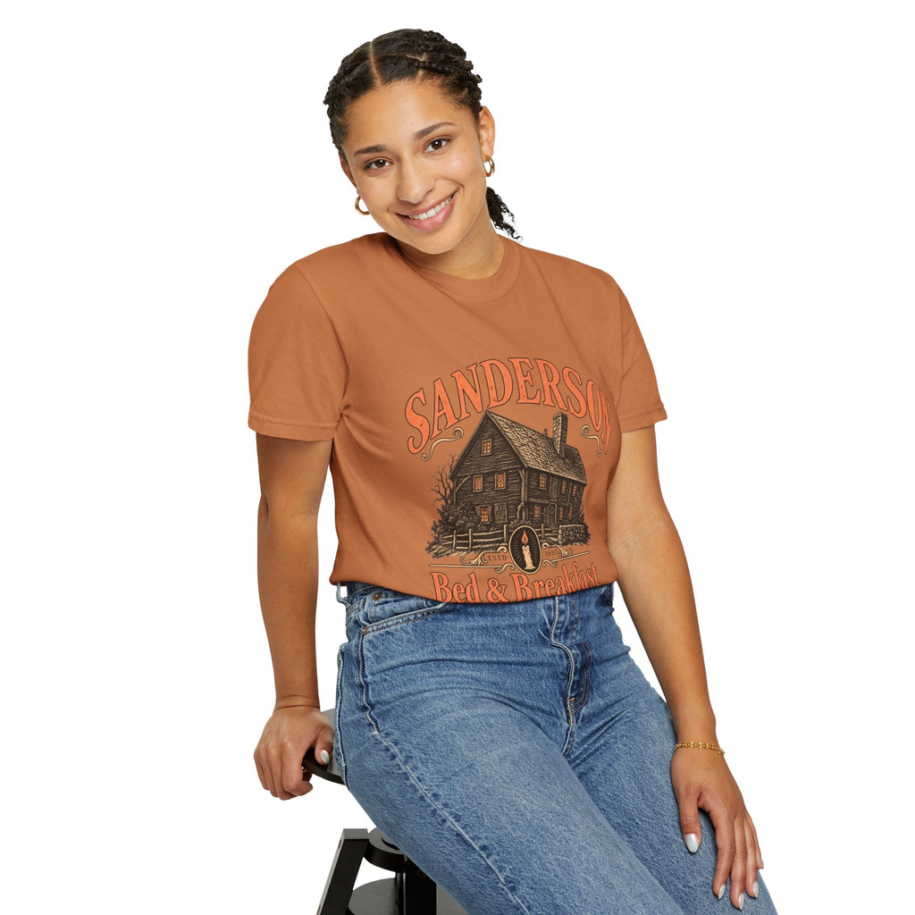 Wicked Thread Society Sanderson Bed & Breakfast graphic tee in rust orange cotton worn by a smiling woman