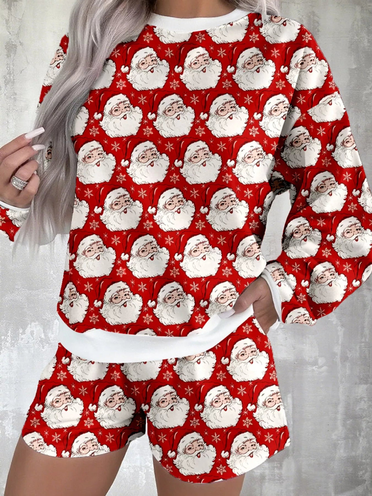 Wicked Thread Society Christmas lounge set featuring a red long-sleeve top and shorts with a Santa Claus print.