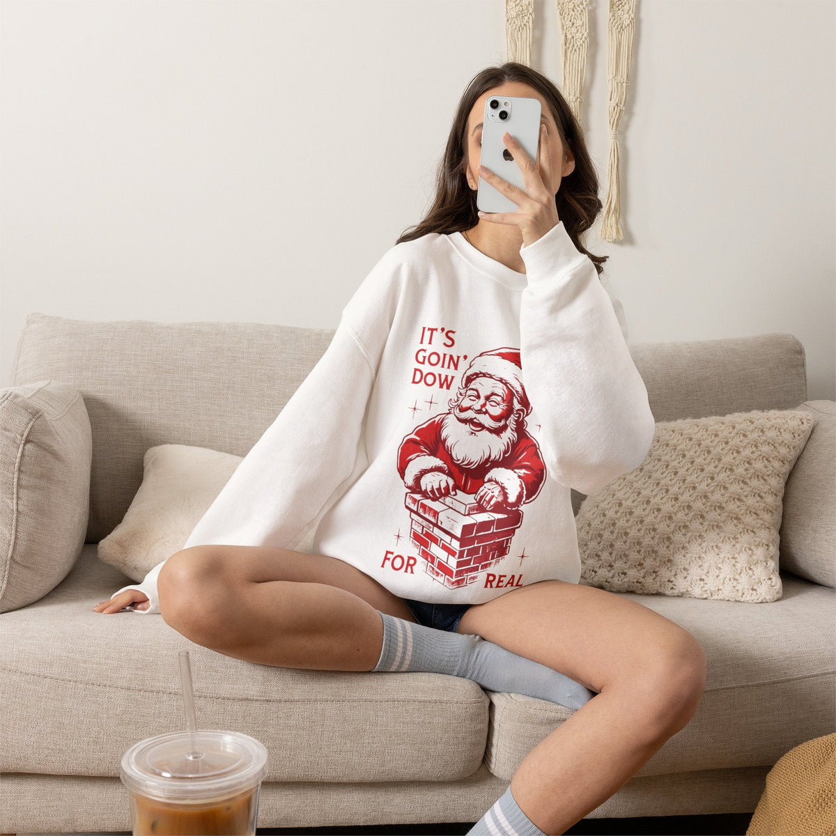 Wicked Thread Society white crewneck sweatshirt featuring a red Santa Claus graphic entering a chimney