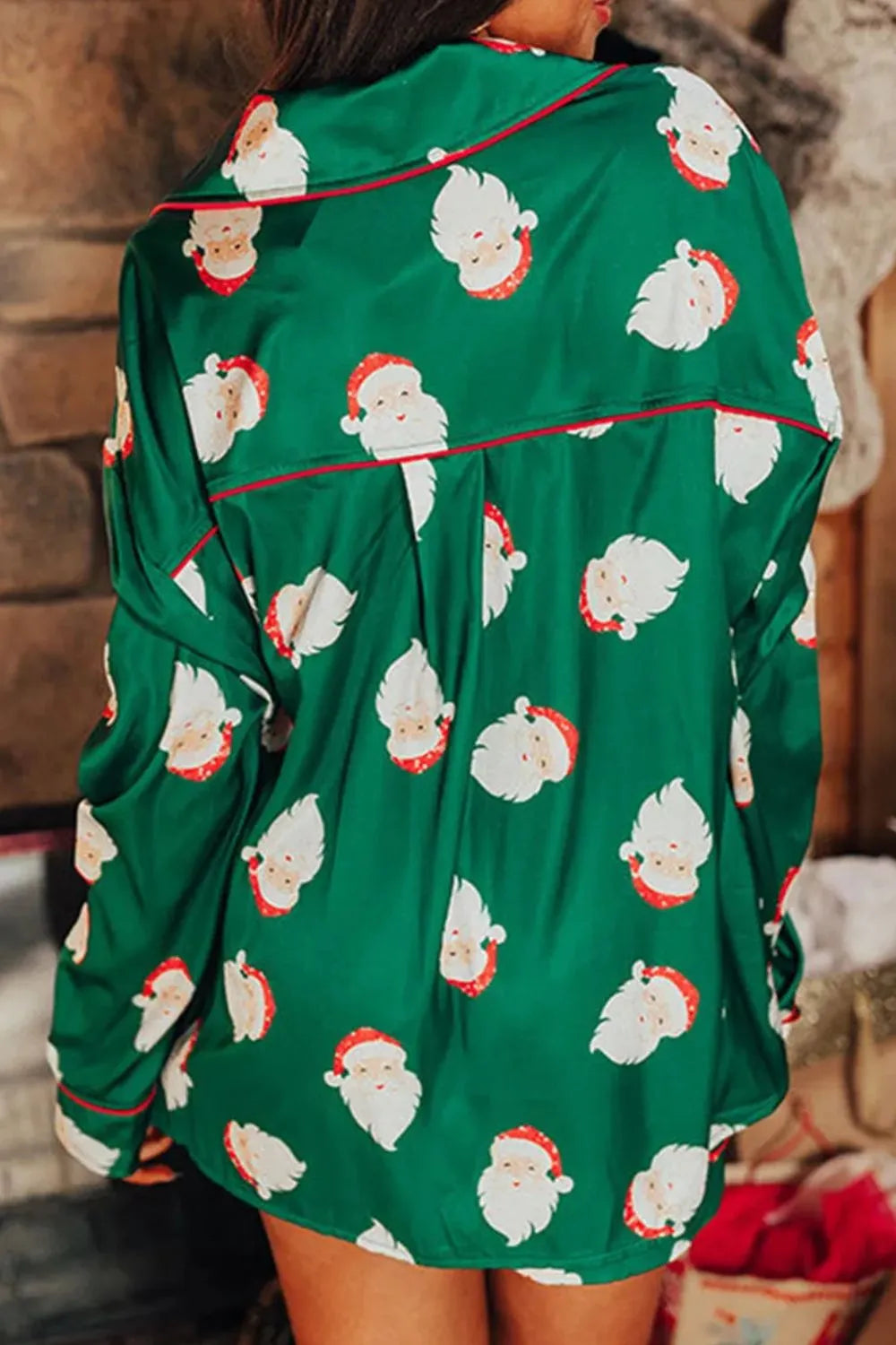 Wicked Thread Society green long sleeve lounge top with a festive Santa Claus print and red piping trim