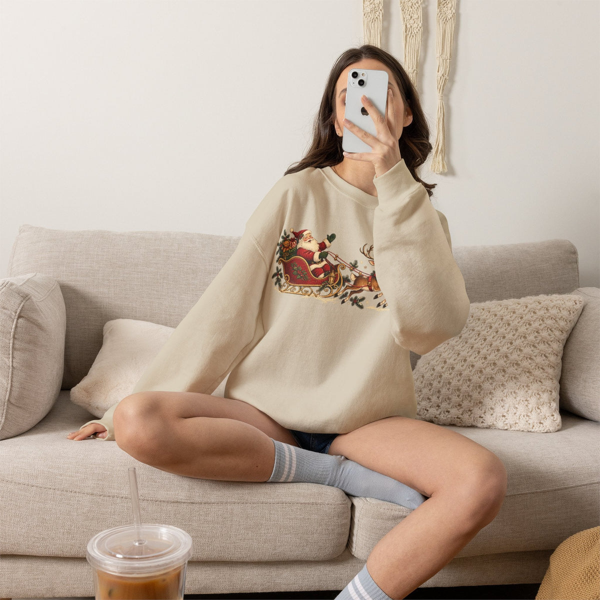 Wicked Thread Society beige crewneck sweatshirt featuring a vintage Santa sleigh and reindeer print on a woman