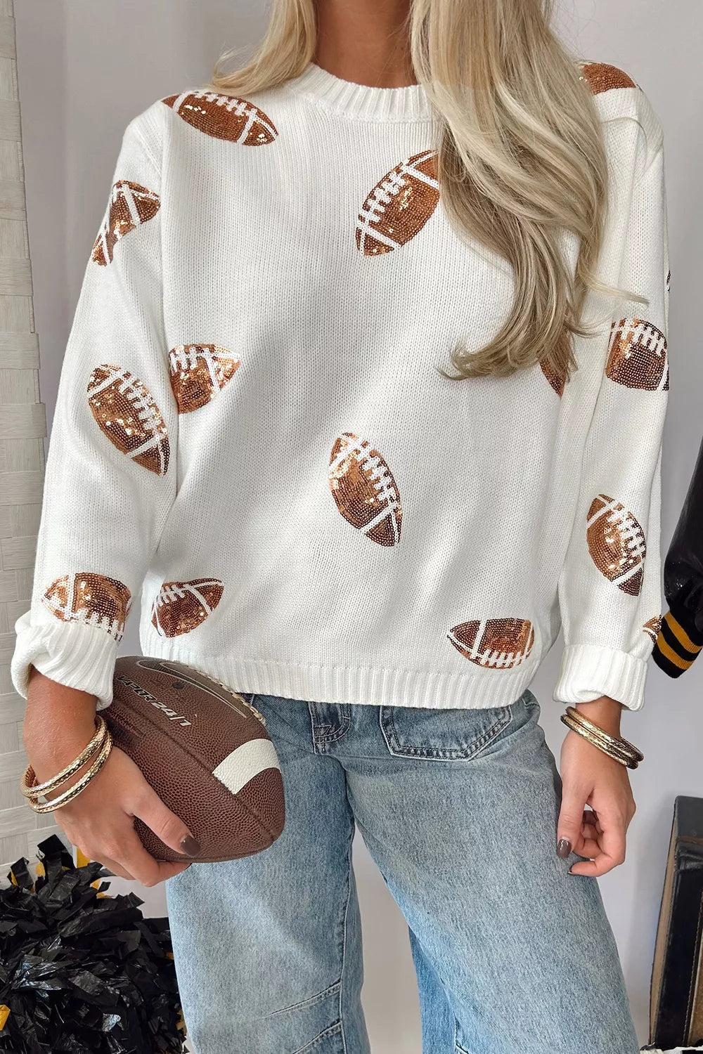 Wicked Thread Society white long sleeve sweater featuring sparkly bronze sequin football patterns and ribbed trim