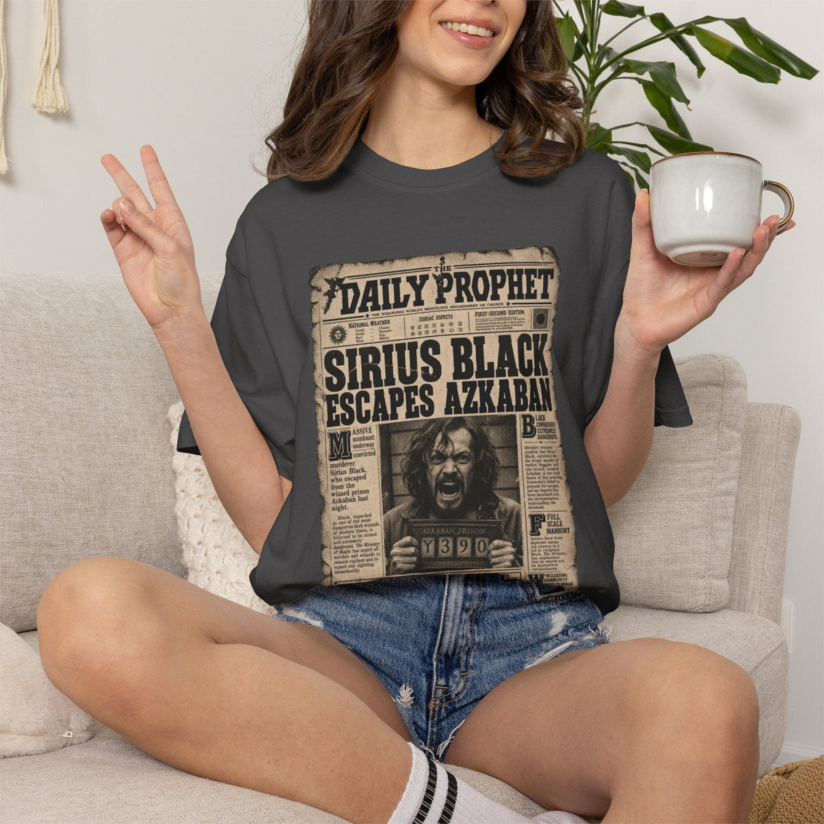 Wicked Thread Society charcoal grey graphic tee featuring a vintage Daily Prophet Sirius Black newspaper print.